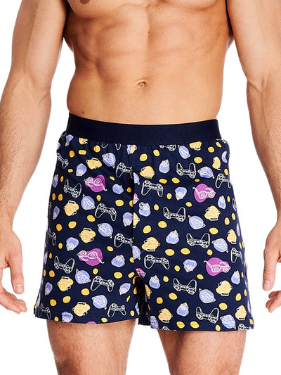 Joe Boxer men's loose boxers navy boxer with a print that has videogames, pizza and sunglasses details in white, yellow and pink
