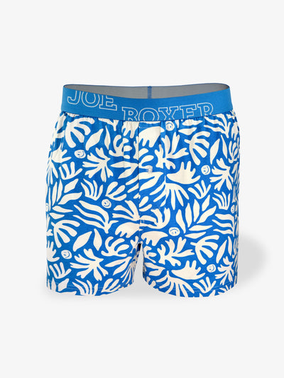 Leaf pattern with small licky. Blue and white colours with blue logo waistband. 