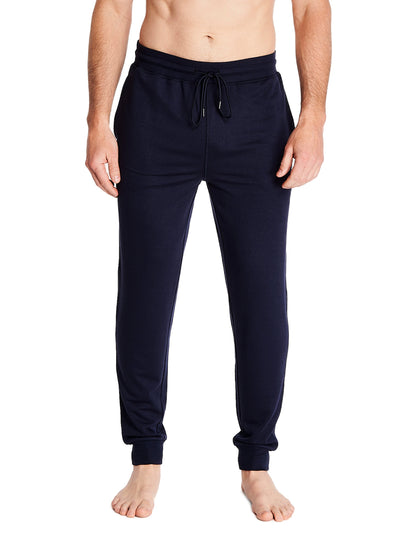 Joe Boxer men's lounge jogger pants in solid navy with covered elastic waistband made of a combination of polyester rayon and spandex for ultimate comfort
